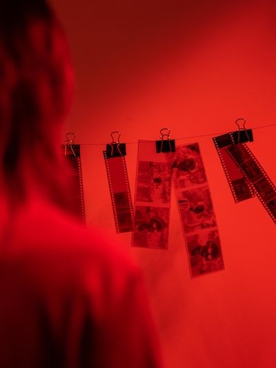 Person Developing Film in a Dark Room